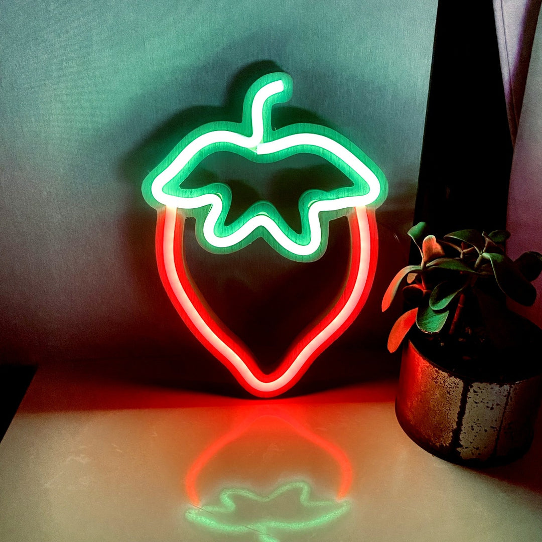 VibeCore Strawberry Neon Light in red, adding a vibrant and playful touch to any space with its fruity glow, perfect for elevating your room's vibe.