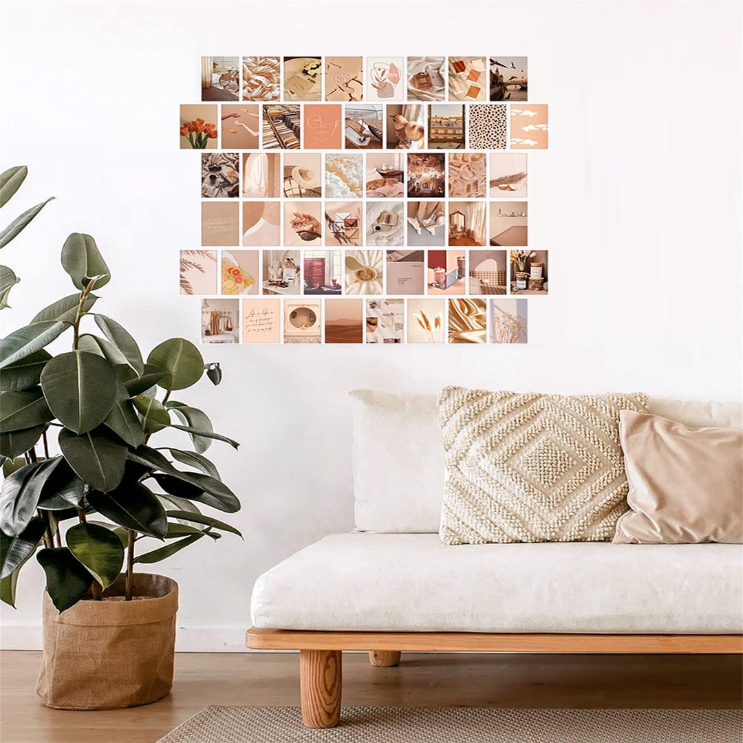 VibeCore Summer Warmth Wall Collage Kit displayed on a living room wall, showcasing 70 serene beige-toned prints with desert-inspired and artsy designs. Ideal for creating a warm, relaxing atmosphere in your home.