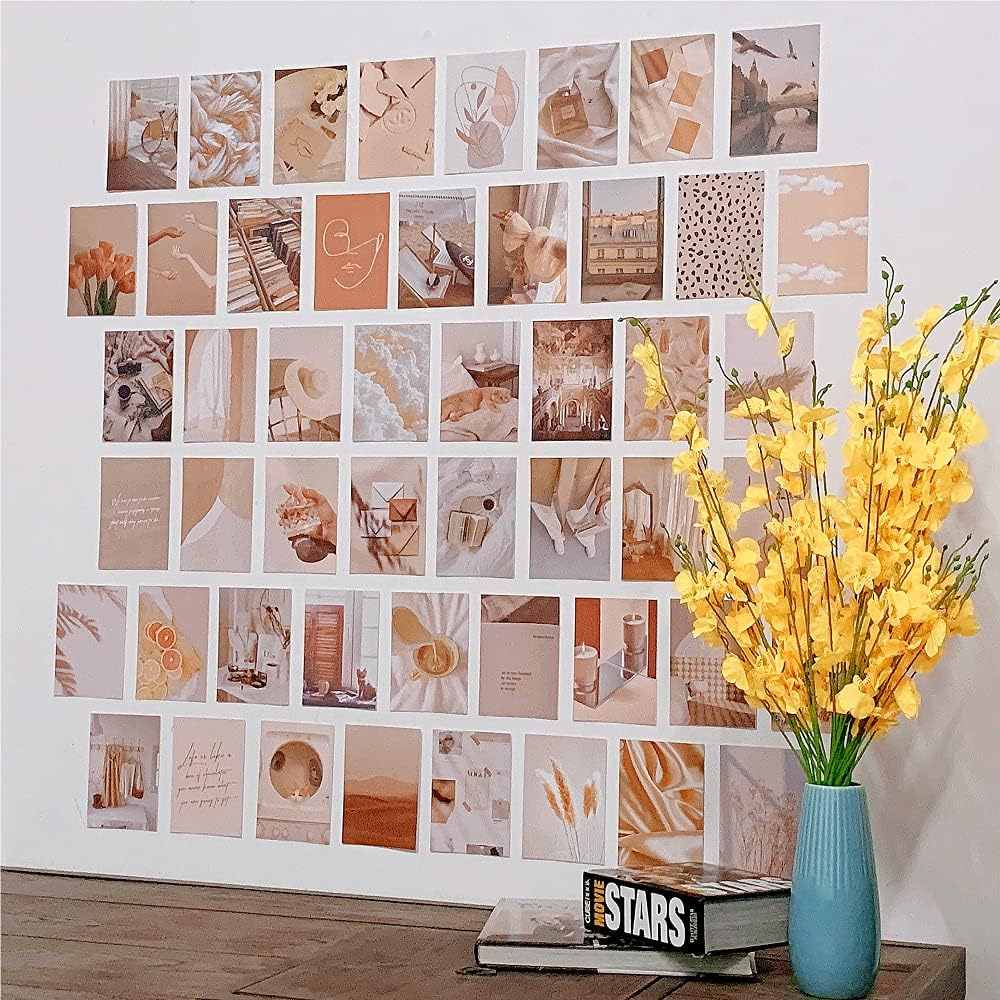 VibeCore Summer Warmth Wall Collage Kit displayed on a wall, featuring 70 serene beige-toned prints with desert-inspired and artsy designs. Perfect for creating a warm, relaxing atmosphere in your room or living space.
