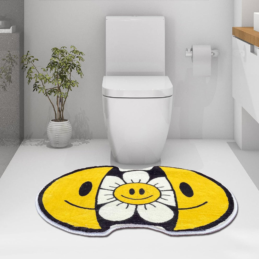 VibeCore Sunshine Split Smiley Accent Rug in a bathroom, showcasing a cheerful smiley face design that splits open to reveal a vibrant sunflower, brightening the space.
