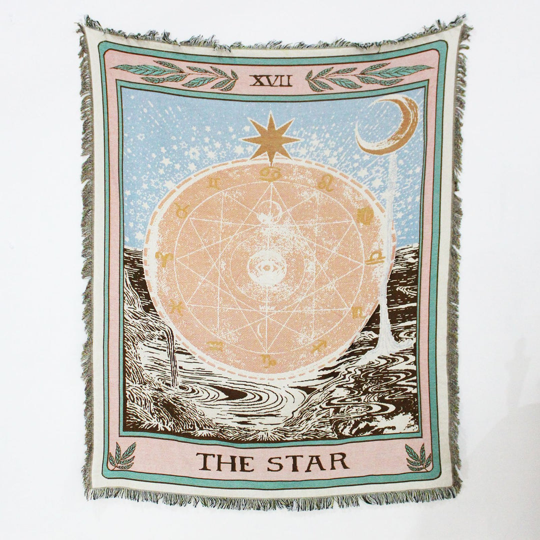VibeCore The Star Tarot Woven Blanket displayed flat, highlighting its reversible celestial-inspired design with vibrant patterns on soft, breathable 100% combed cotton fabric.