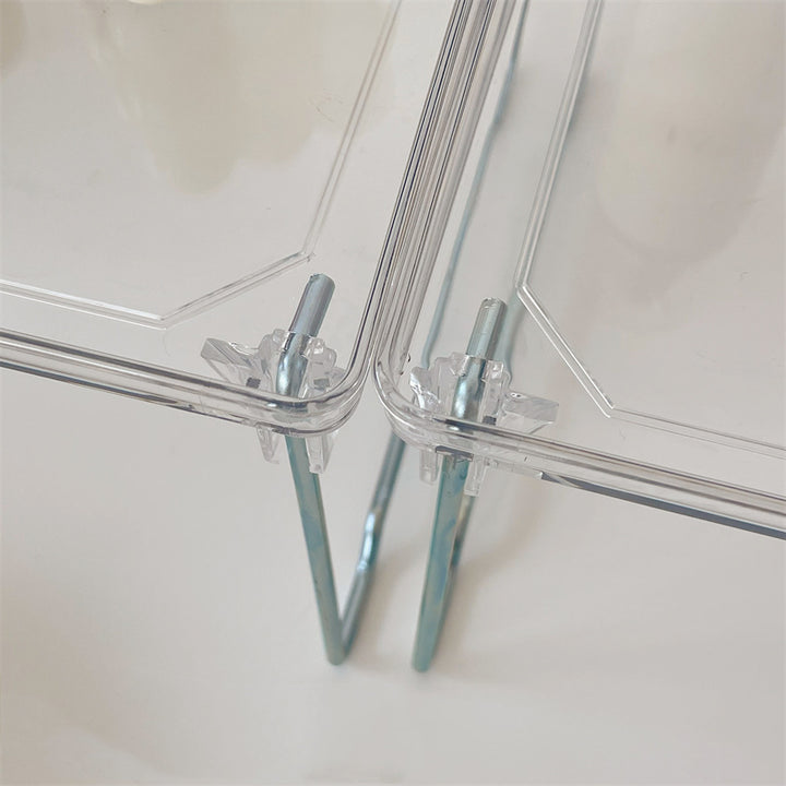 VibeCore Transparent Acrylic Foldable Shelf leg close-up, highlighting the rust-free metal leg for durability and elegant design, adding a modern touch to any space.