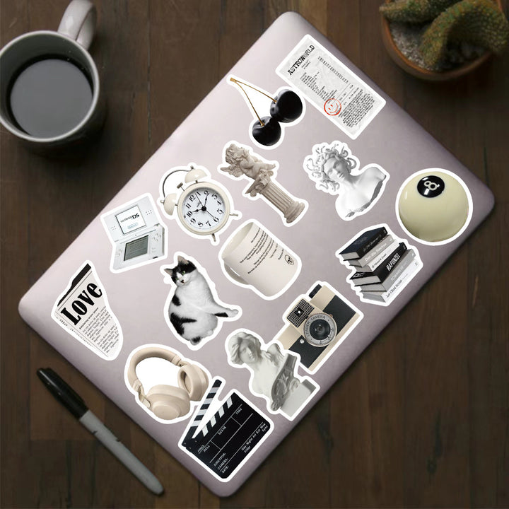 VibeCore Urban Alt Stickers on a laptop showcasing bold black and white alternative aesthetic designs. Ideal for adding an edgy, urban touch to your laptop and accessories.