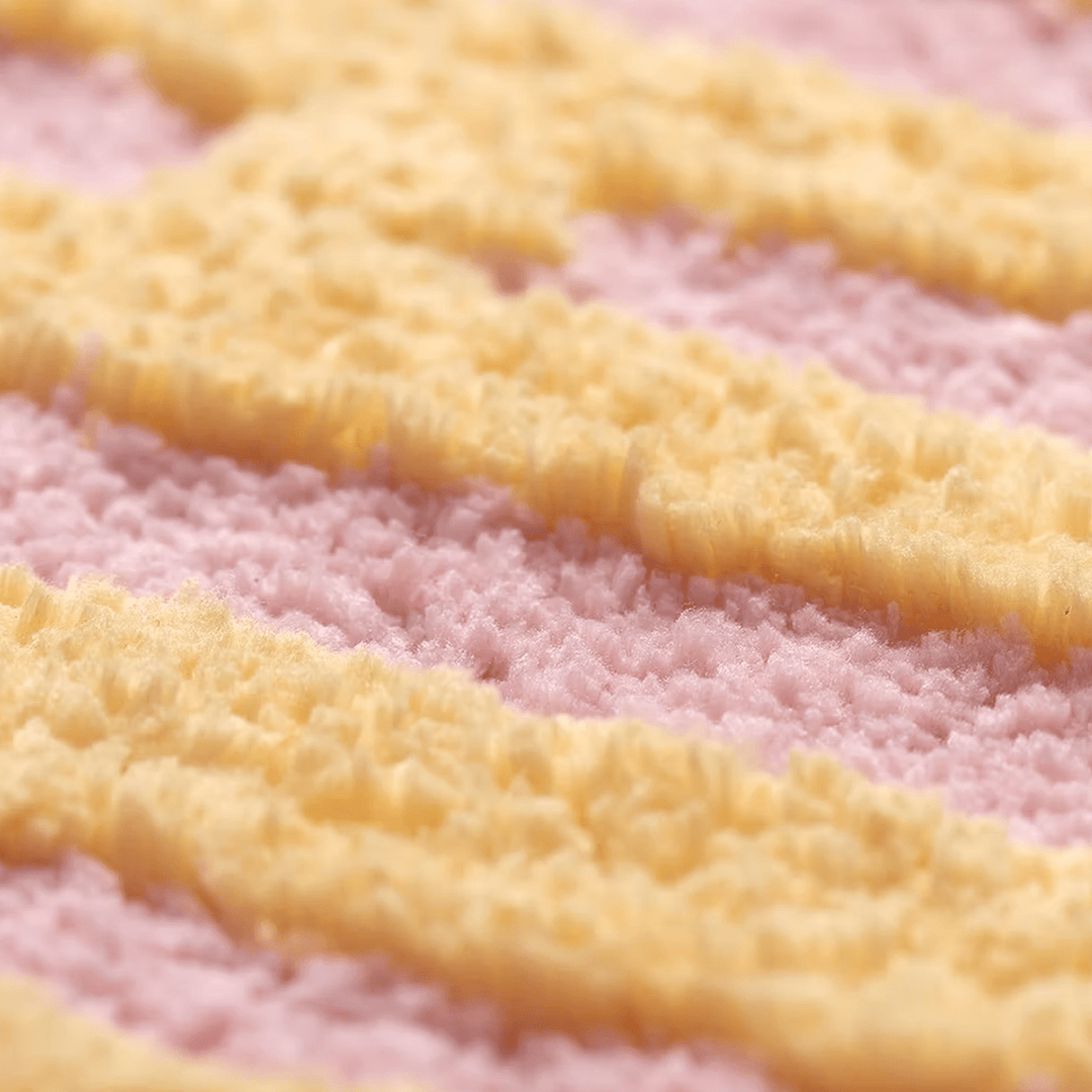 Close-up of the VibeCore AHHHH! Accent Rug, highlighting the plush texture and bold design with vibrant colors and playful text, perfect for adding character to any space.