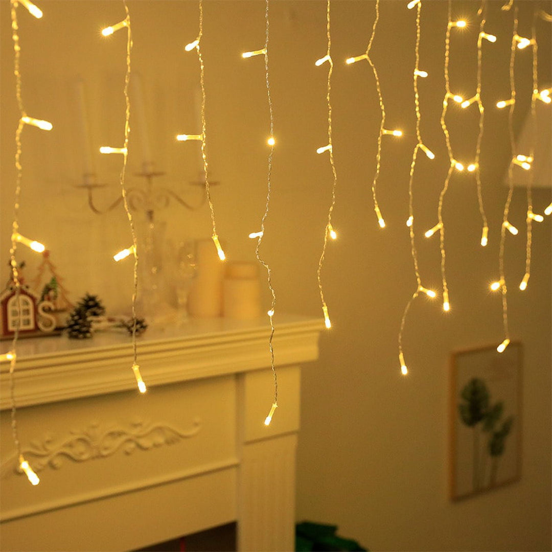 VibeCore waterfall string lights in warm white, cascading softly with 216 LEDs, creating a cozy, vibrant ambiance for any space, indoors or outdoors.