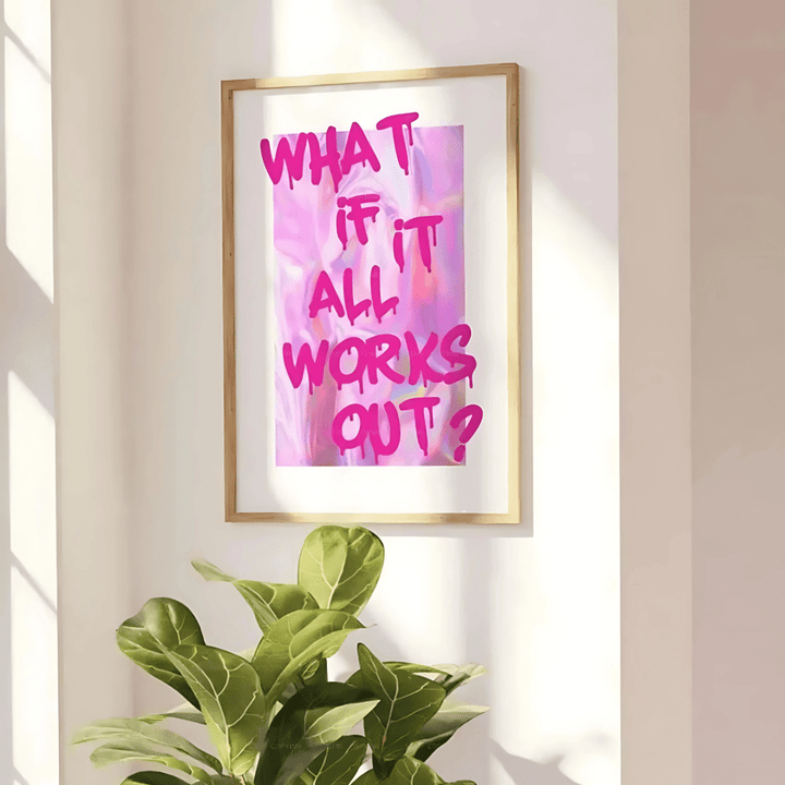 VibeCore 'What If It All Works Out' Canvas Poster angled on the wall, showcasing a preppy, graffiti-inspired design in pink. This playful, contemporary print adds a fun, girly vibe to any space, perfect for bedrooms, dorms, or apartments. Made from durable cotton canvas with a semigloss finish, it offers vibrant colors and lasting charm.