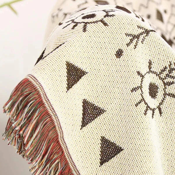 VibeCore White Boho Mandala Woven Blanket back pattern close-up, showcasing the intricate, reversible boho mandala design. Made from soft, breathable 100% combed cotton, it offers a unique, stylish pattern that complements any room.
