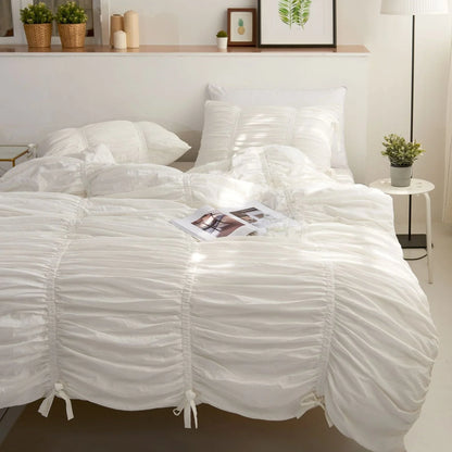 White ruched duvet cover set front view on bed, aesthetic cotton bedding with tufted details, cozy breathable cotton, elegant room decor, VibeCore fleece duvet_cover set, romantic minimalist style, soft white bedding, coquette bedroom inspiration, dreamy timeless design, luxury twin or king bedding set.