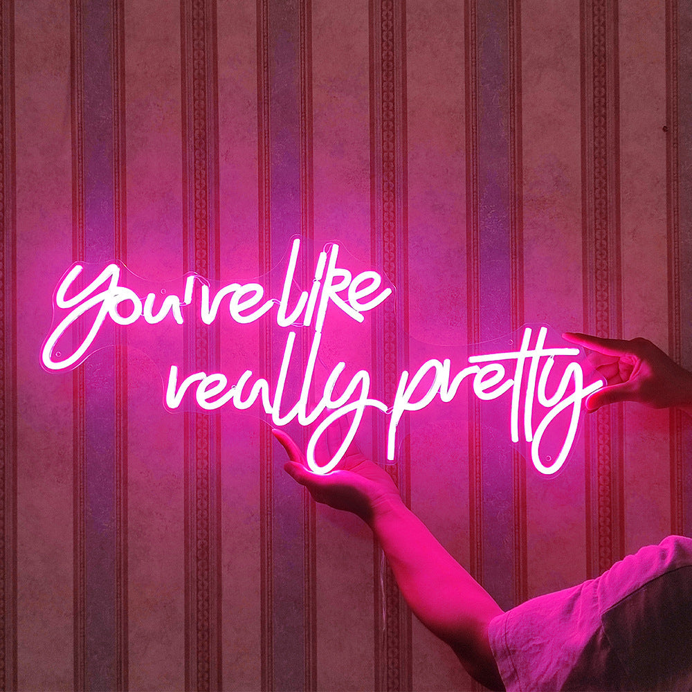 VibeCore You're Like Really Pretty Neon Light Being Held Up