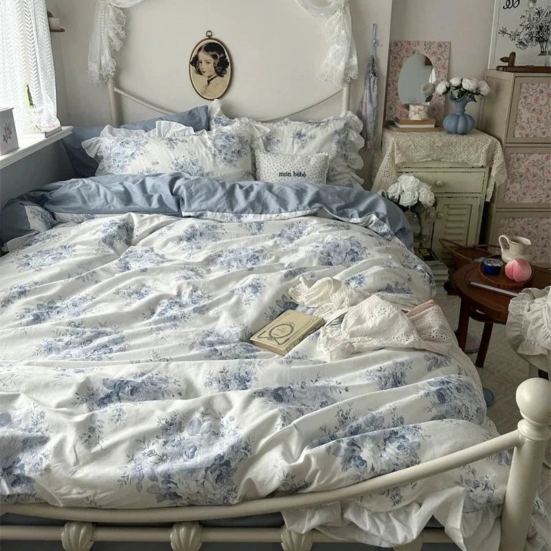Vintage-style bedroom with floral bedding and decorative elements.