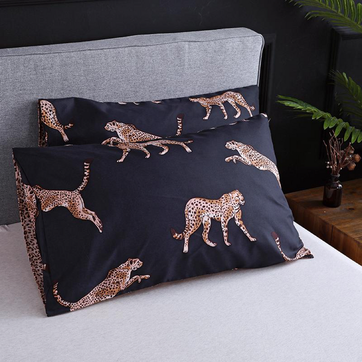 Close-up of the VibeCore Aesthetic Cheetah Cat Duvet Cover Set pillowcase, featuring a playful cheetah print that perfectly complements the duvet cover for a bold and trendy bedroom or dorm look.