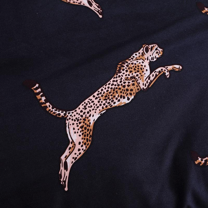 Close-up of the bold cheetah cat print on the VibeCore Aesthetic duvet cover set, showcasing a jumping cheetah cat that adds a fun, trendy touch to your bedroom decor.