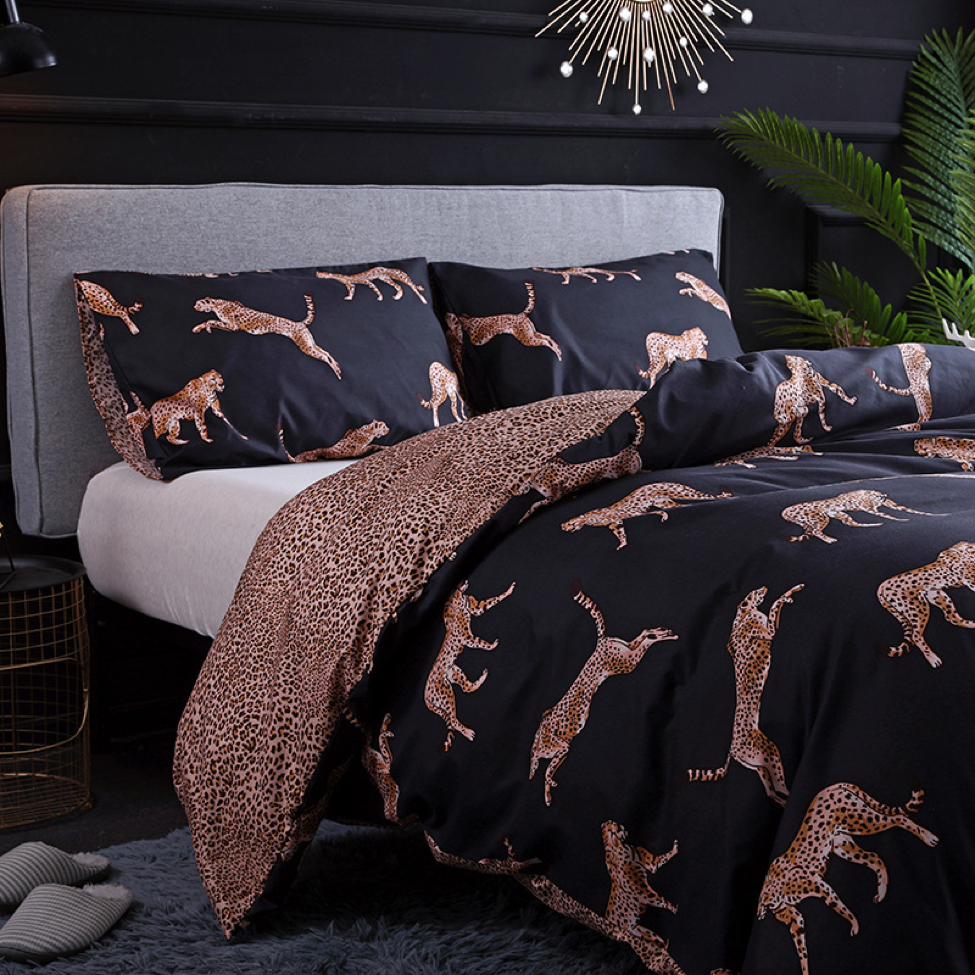 Side view of the VibeCore Aesthetic Cheetah Cat Duvet Cover Set, highlighting the dynamic cheetah print and luxurious texture that brings bold, animal-inspired vibes to your bedroom or dorm decor.