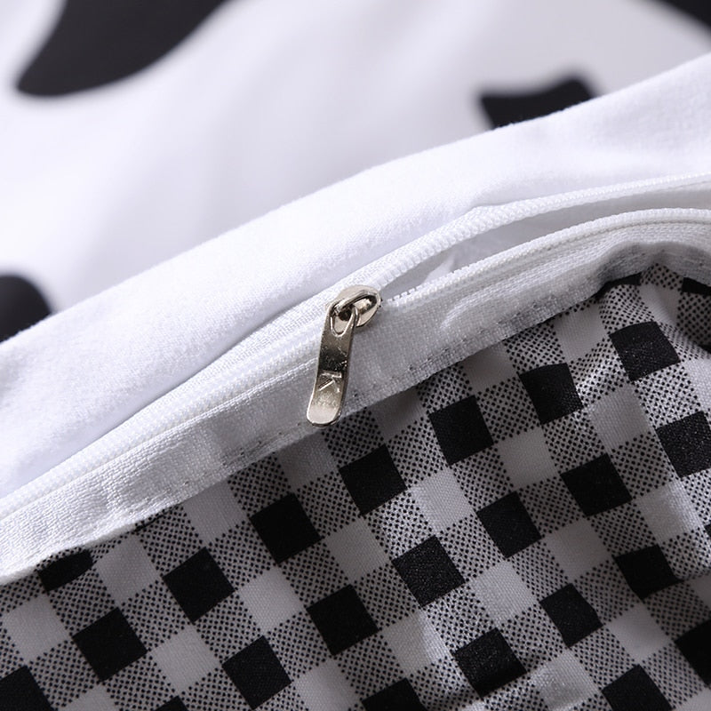 Close-up of duvet zipper on the VibeCore Cow Print Bedding Set, highlighting the sturdy, smooth zipper for easy use and a secure fit, paired with the trendy cow print design for a stylish and functional bedroom update.