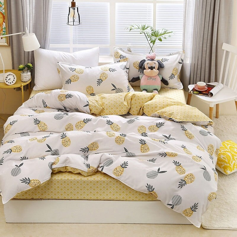Aerial view of the VibeCore Aesthetic Pineapple Duvet Cover Set, showcasing its playful and vibrant pineapple pattern. The durable cotton-polyester blend offers year-round comfort, making this bedding set a stylish and cozy addition to any bedroom or dorm with a tropical touch.