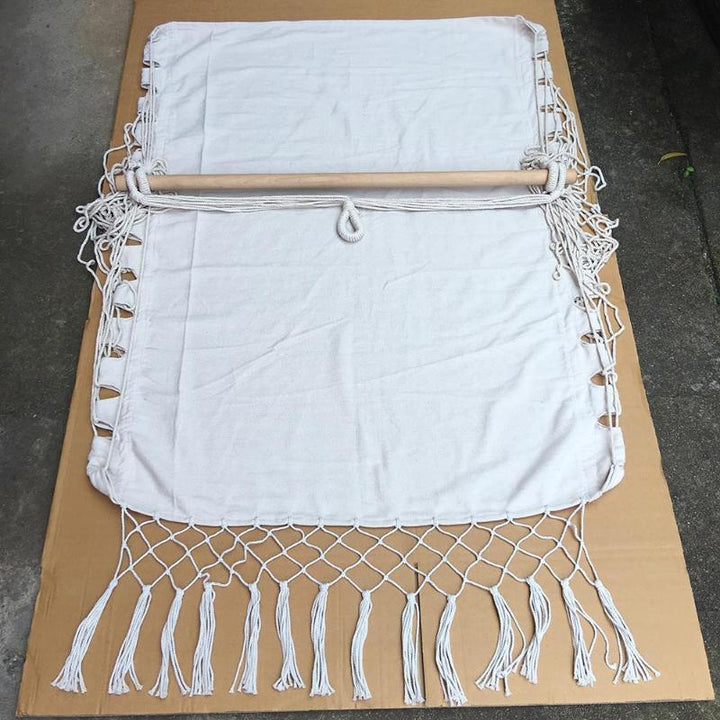 Aesthetic Bohemia style hanging hammock chair package includes the hammock chair made of high-quality cotton thread, perfect for adding a cozy, bohemian touch to your space. Please note, stick and pillow are not included.