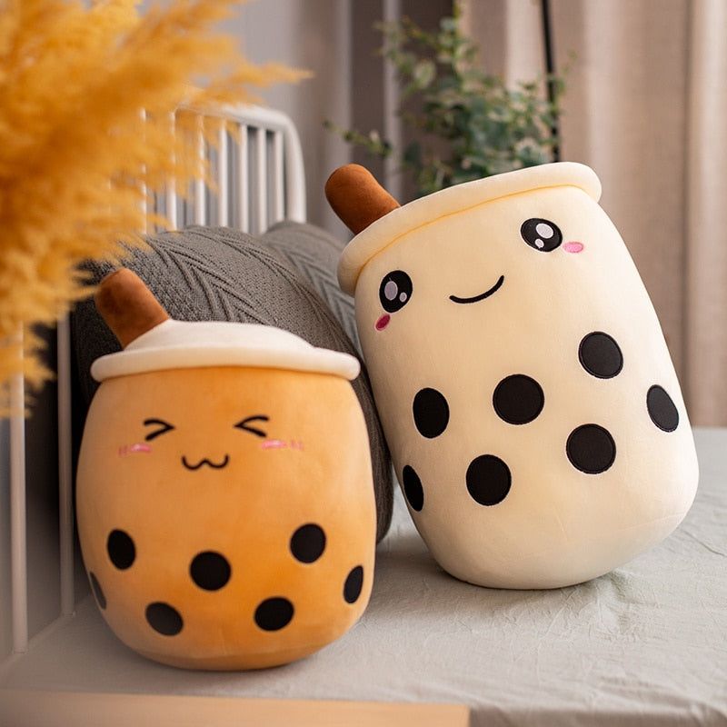 VibeCore Bubble Tea Stuffy plush pillows in two sizes, featuring a cute cartoon smiley face and boba design, adding a kawaii touch to any room.
