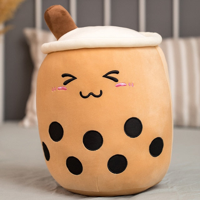 VibeCore Bubble Tea Stuffy in brown with closed eyes, a soft plush boba pillow with a cute sleepy expression, perfect for cozy decor.