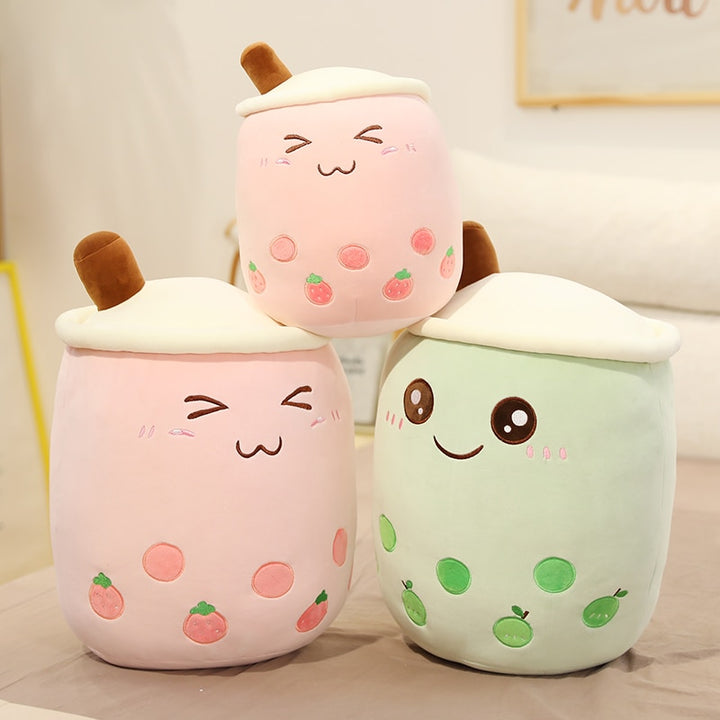 VibeCore Bubble Tea Stuffy in green and pink, adorable plush boba pillows with smiley faces, perfect for kawaii room decor and cozy spaces.