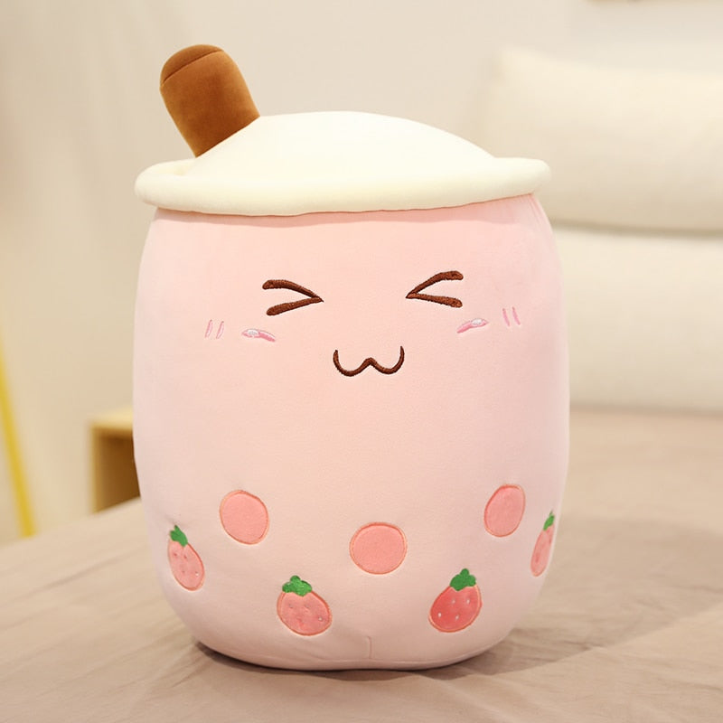 VibeCore Bubble Tea Stuffy in pink, an adorable plush boba pillow with a cute smiley face, perfect for cozy and kawaii room decor.