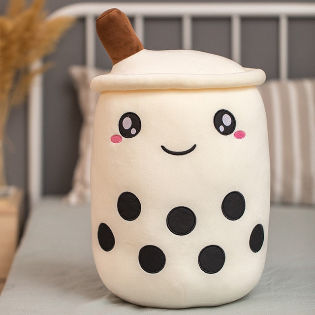 VibeCore Bubble Tea Stuffy in white, a soft plush boba pillow with a cute smiley face, perfect for cozy and kawaii room decor.