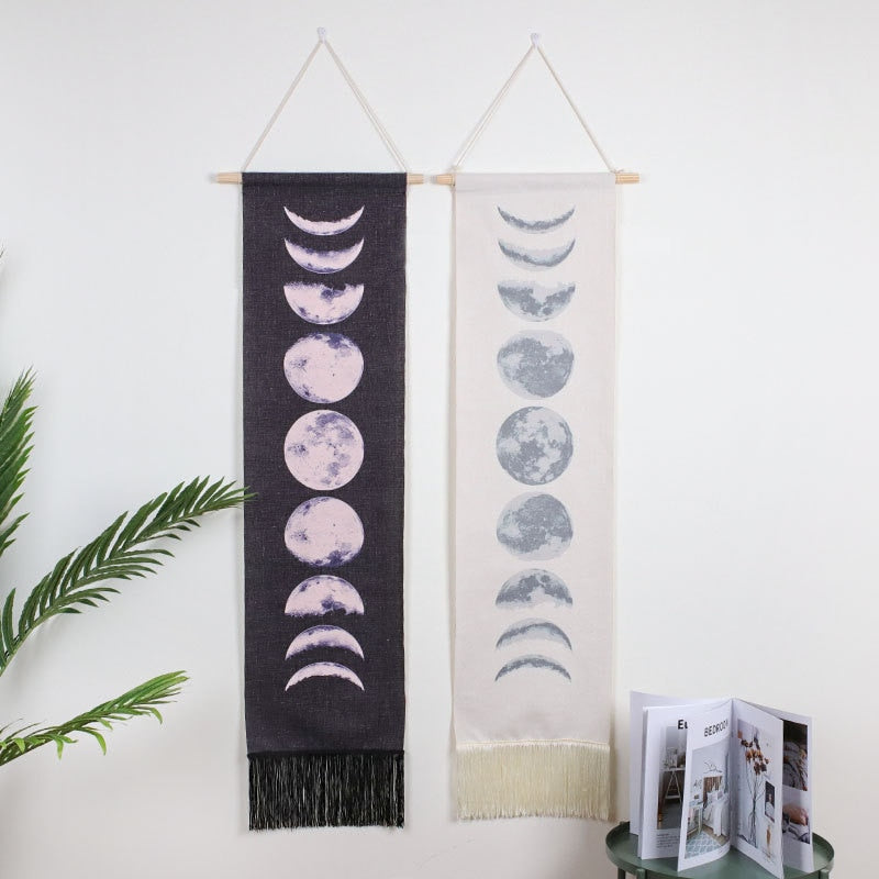 VibeCore Nine Phases of the Moon Wall Hanging in black and white, featuring the complete moon cycle design crafted from natural cotton-linen and strung with twine for a unique, celestial ambiance.