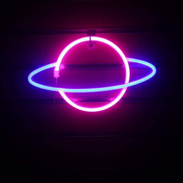 Aesthetic VibeCore Out Of This World Planet Neon Light in pink and purple, USB or battery-powered LED sign for trendy bedroom, dorm, or gaming room decor, adding a cosmic glow to any space.