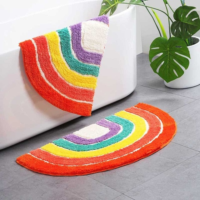 VibeCore Rainbow Plush Rug in the bathroom, featuring vibrant colors and a soft, fluffy texture. Water-absorbent with a non-slip backing, perfect for adding comfort and style to your bathroom. Durable and easy to clean.
